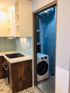 Phòng giặt căn hộ Saigon South Residence Cho thuê căn hộ tầng cao Saigon South Residence, view hồ bơi nội khu thoáng mát, vị trí giáp Quận 7.