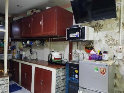Phòng bếp nhà phố Quận Tân Phú Nhà phố hướng Tây diện tích sử dụng 38m2, có sổ hồng riêng đầy đủ.