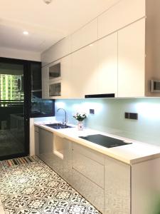 Bếp  Căn hộ Feliz En Vista Căn hộ Feliz En Vista tầng cao, nội thất cơ bản, view thành phố.