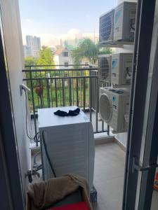 máy giặc Bán căn hộ Sunrise Riverside tầng thấp, đầy đủ nội thất hiện đại.