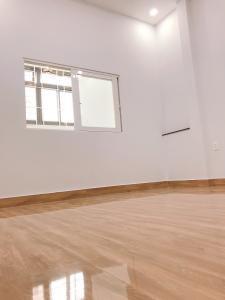 Phòng ngủ nhà phố Nhà phố trung tâm Tân Phú hướng Nam, hẻm xe ba gác.