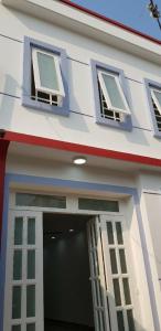 Bán nhà phố 2 tầng đường Nguyễn Văn Linh, phường Bình Thuận, Quận 7, diện tích đất 49.7m2, diện tích sử dụng 68.2m2.