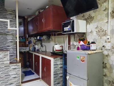 Phòng bếp nhà phố Quận Tân Phú Nhà phố hướng Tây diện tích sử dụng 38m2, có sổ hồng riêng đầy đủ.