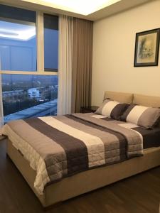 Phòng ngủ căn hộ Sarica Condominium Căn hộ Sarica Condominium cửa hướng Nam, view thành phố sầm uất.