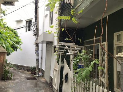 Cổng vào nhà phố quận Phú Nhuận Bán nhà phố đường hẻm Phan Xích Long, phường 2, quận Phú Nhuận, diện tích đất 15.8m2, sổ hồng đầy đủ.
