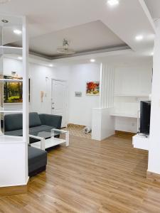 Phòng khách chung cư Hưng Vượng 2 Bán căn hộ chung cư Hưng Vượng 2, vị trí thuận lợi, nằm sát khu đô thị Phú Mỹ Hưng.