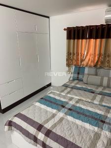 Phòng ngủ nhà phố Quang Trung, Gò Vấp Nhà phố hướng Tây, diện tích 33.8m2, đầy đủ nội thất tiện nghi.