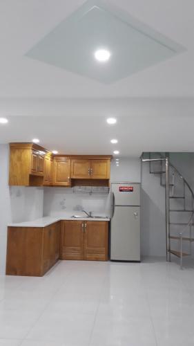 bếp  Nhà phố hướng Tây Nam, gần đại lộ Võ Văn Kiệt.