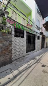Mặt trước nhà phố Quận 4 Bán nhà hẻm Tôn Đản, phường 15, Quận 4, DT 54m2, sổ hồng chính chủ