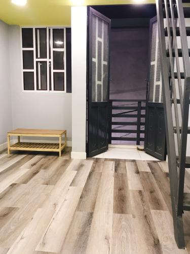 Phòng ngủ nhà phố Quận 7 Nhà phố diện tích sử dụng 30.8m2, có sổ hồng và pháp lý rõ ràng.