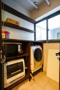 Phòng giặt căn hộ FELIZ EN VISTA Cho thuê căn hộ Feliz en Vista tầng thấp, diện tích 102.58m2 - 2 phòng ngủ