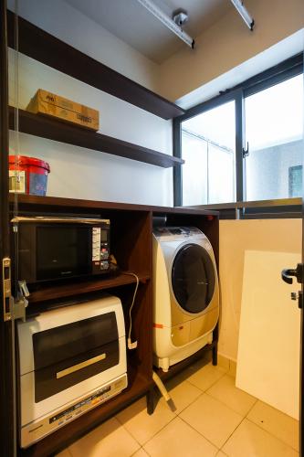 Phòng giặt căn hộ FELIZ EN VISTA Cho thuê căn hộ Feliz en Vista tầng thấp, diện tích 102.58m2 - 2 phòng ngủ