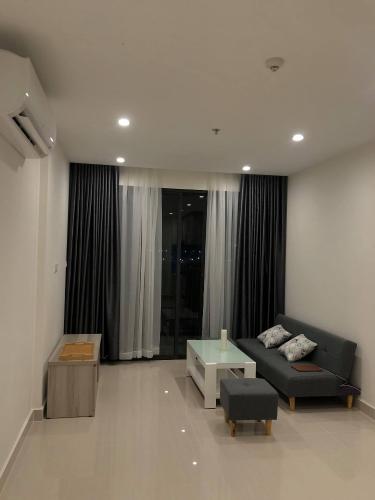 Phòng khách Vinhomes Grand Park Quận 9 Căn hộ tầng trung Vinhomes Grand Park thiết kế hiện đại.