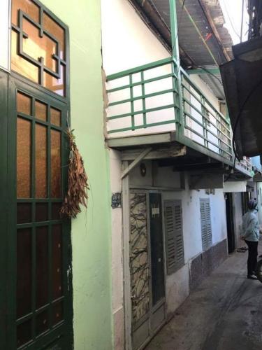 Đường hẻm nhà phố Quận 7 Nhà phố diện tích sử dụng 30.8m2, có sổ hồng và pháp lý rõ ràng.