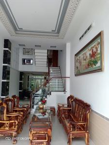 Phòng khách nhà phố Quận 7 Bán nhà 3 tầng KDC Tân Thuận Nam, Quận 7, sổ hồng, nội thất cơ bản