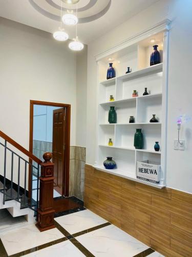 Phòng khách Nhà phố Q.Gò Vấp hướng Bắc bàn giao đầy đủ nội thất, có sổ hồng riêng.