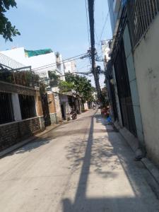 Đường hẻm nhà Quận Tân Bình Nhà phố Q.Tân Bình diện tích sử dụng 100m2, sổ hồng pháp lý rõ ràng.
