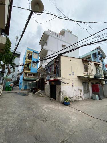 Hẻm nhà phố Lý Phục Man, Quận 7 Nhà phố hẻm xe hơi, diện tích 67.8m2, bàn giao sổ hồng riêng.