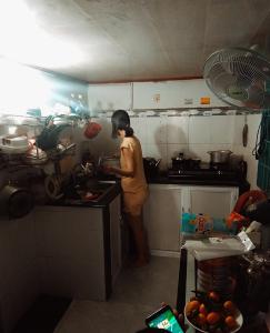 Bếp nhà phố Nhà phố Quận 12 cửa hướng Nam diện tích 60m2, hẻm xe máy.