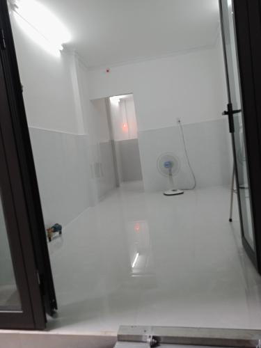 Phòng khách nhà phố Nhà phố Quận 7 hướng Tây diện tích đất 3mx7m, hẻm xe máy.