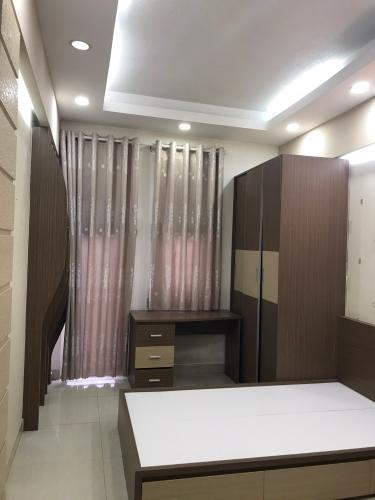 Phòng ngủ nhà phố Quận 1 Nhà phố trung tâm thành phố Quận 1 hướng Nam, đầy đủ nội thất.