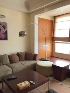 Phòng khách căn hộ The Manor Bán căn hộ cao cấp The Manor đầy đủ nội thất, view thành phố.