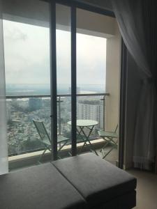 Ban công Masteri Millennium Quận 4 Căn hộ Masteri Millennium đầy đủ nội thất, hướng Đông Nam.