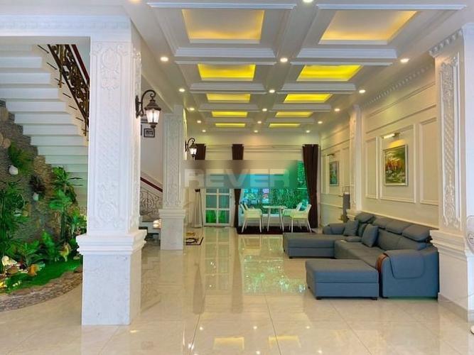 Biệt thự Quận 7 Biệt thự diện tích 130m2 kết cấu 1 trệt 3 lầu, khu vực ven sông mát mẻ.