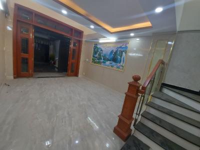 Không gian nhà phố Quận Gò Vấp Nhà phố diện tích 64m2, kết cấu 1 trệt 3 lầu và sân thượng, sổ hồng riêng.