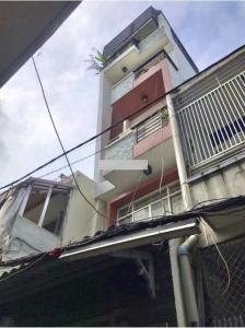 Mặt tiền nhà phố Quận 1 Nhà phố trung tâm thành phố Quận 1 hướng Nam, đầy đủ nội thất.