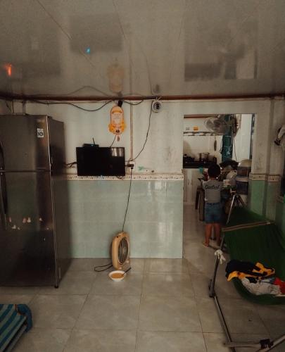 Phòng khách nhà phố Nhà phố Quận 12 cửa hướng Nam diện tích 60m2, hẻm xe máy.