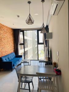 Phòng khách Jamila Khang Điền, Quận 9 Căn hộ Jamila Khang Điền tầng trung, cửa chính hướng Tây Nam.