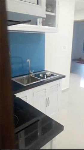 Phòng bếp Vinhomes Grand Park Quận 9 Căn hộ Vinhomes Grand Park tầng trung, ban công đón gió và ánh sáng.