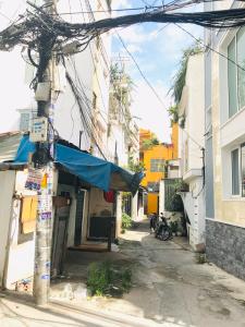 Nhà phố quận Bình Thạnh Bán nhà hẻm xe hơi đường Nơ Trang Long, dân cư sầm uất, sổ hồng pháp lý đầy đủ, giao nhà ngay.
