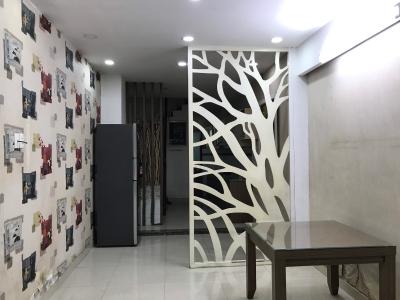 Phòng khách nhà phố Quận 1 Nhà phố trung tâm thành phố Quận 1 hướng Nam, đầy đủ nội thất.