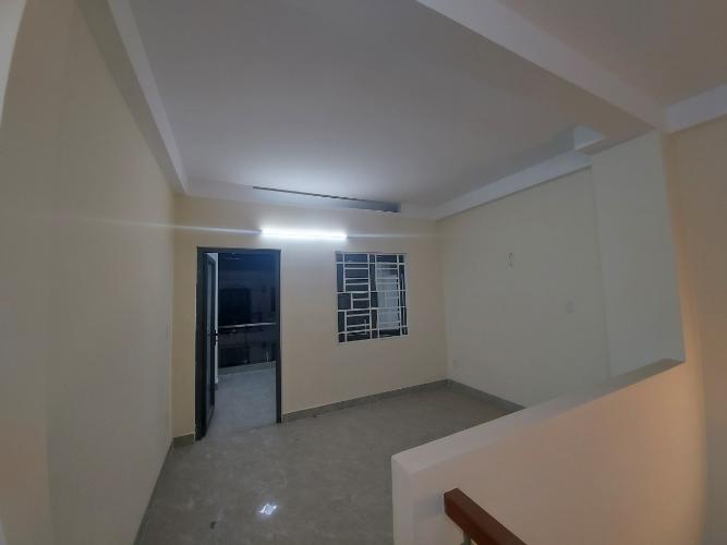 Không gian nhà phố Quận Gò Vấp Nhà phố diện tích 64m2, kết cấu 1 trệt 3 lầu và sân thượng, sổ hồng riêng.