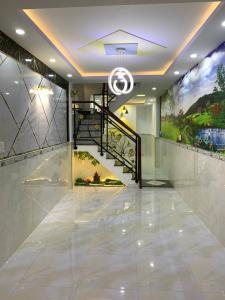 Phòng khách nhà phố Nhà phố hướng Nam diện tích đất 3.2mx13.4m, khu an ninh.