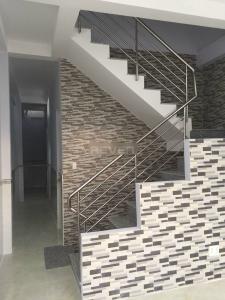 Bên trong nhà phố Ích Thạnh, Quận 9 Nhà phố 1 trệt 2 lầu hướng Tây Nam, đường trước nhà 6m rộng rãi