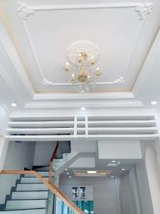 Phòng khách nhà phố Quận Tân Phú Nhà phố Q.Tân Phú hướng Tây diện tích sử dụng 172.8m2, đầy đủ nội thất.