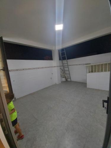 Không gian nhà phố Quận Gò Vấp Nhà phố diện tích 64m2, kết cấu 1 trệt 3 lầu và sân thượng, sổ hồng riêng.