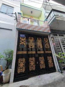 Nhà phố Quận 7 Nhà phố kết cấu 1 trệt 1 lầu hướng Tây, khu dân cư đông đúc.