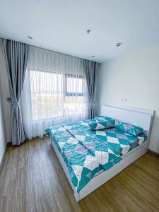 Phòng ngủ Vinhomes Grand Park Quận 9 Căn hộ Vinhomes Grand Park tầng trung, nội thất hiện đại.