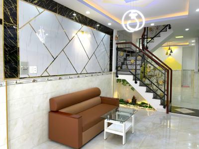 Phòng khách nhà phố Nhà phố hướng Nam diện tích đất 3.2mx13.4m, khu an ninh.