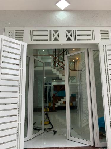 Phòng khách nhà phố Bình Tân Nhà phố khu Lux Home Gardens diện tích sử dụng 220m2, hướng Tây.