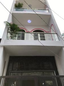 Mặt tiền nhà phố Quận Tân Phú  Nhà phố Quận Tân Phú hẻm xe hơi rộng 4m, sổ hồng riêng.