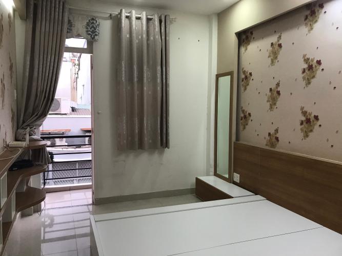 Phòng ngủ nhà phố Quận 1 Nhà phố trung tâm thành phố Quận 1 hướng Nam, đầy đủ nội thất.