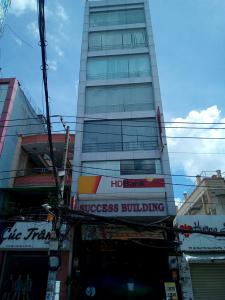 Mặt tiền văn phòng Quận Tân Phú Văn phòng tòa nhà Success Building, có thang máy và hầm để xe.