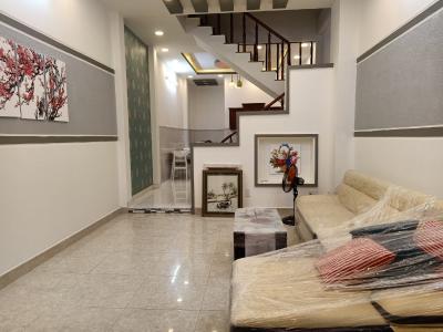 Phòng khách nhà phố đường Đào Tông Nguyên, Nhà Bè Nhà phố hướng Tây Bắc diện tích 108m2, hẻm xe hơi rộng.