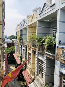 View ban công nhà phố Trương Đình Hội, Quận 8 Nhà phố diện tích 38.5m2, thiết kế kỹ lưỡng cùng gam màu xanh mát.