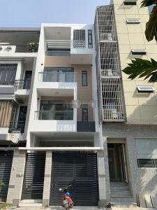 Hình chính diện nhà phố Văn phòng Quận 2 diện tích 160m2 có hầm để xe, lối đi riêng.